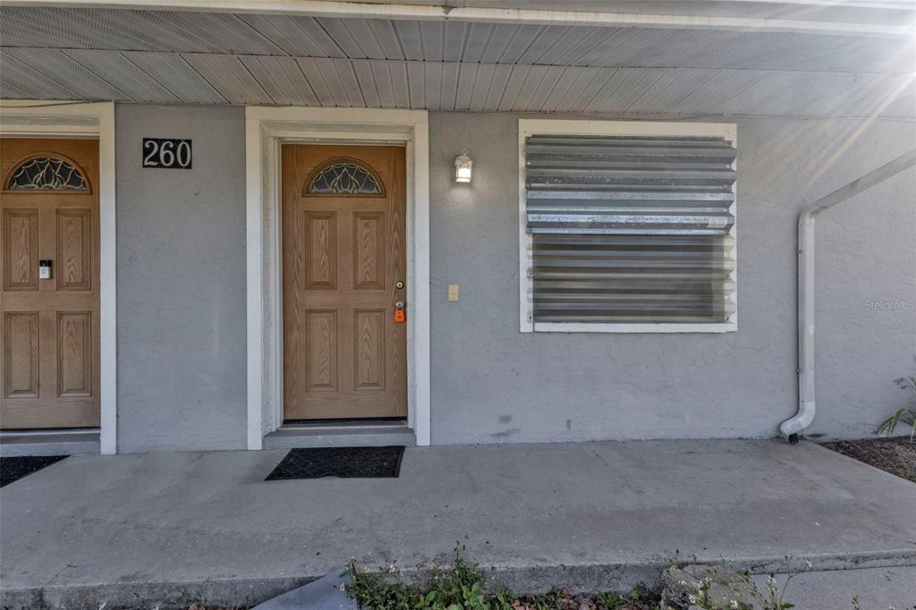Photo of 260 Lomond Drive, Port Charlotte, FL 33953 (MLS # C7508243)