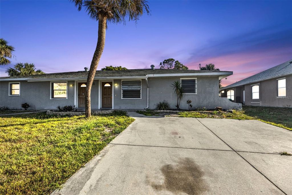 Photo of 260 Lomond Drive, Port Charlotte, FL 33953 (MLS # C7508243)