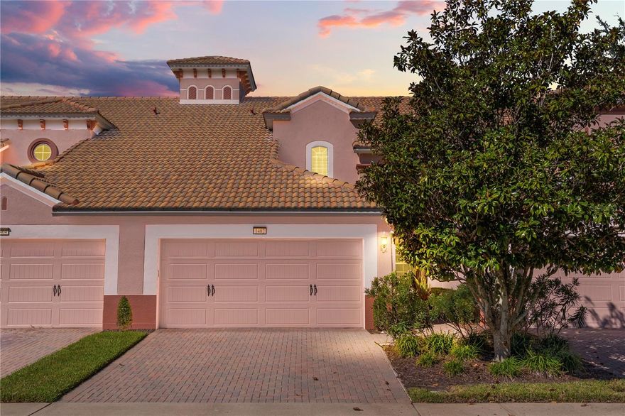 Located in the gated community of BellaTrae at ChampionsGate, this 3-bedroom, 2.5-bath townhome offers approximately 2,059 square feet of living space and a tranquil pond view. Built in 2011, this home has been thoughtfully renovated within the last two years.
As you enter the main doorway, you are welcomed by an open-concept layout. To the right of the foyer is a formal dining area with tray ceilings, followed by an expansive family room offering views of the enclosed lanai and pond. To the left of the family room is the remodeled kitchen, featuring stainless steel appliances, quartz countertops, a new backsplash, updated LED lighting, and crown molding with wainscoting detail. A cozy dinette area sits just off the kitchen and connects seamlessly to the lanai, creating a comfortable transition between indoor and outdoor living.
The kitchen leads to a well-appointed laundry room with custom storage cabinets, a newer washer and dryer (approximately 1.5 years old), and direct access to a two-car garage with built-in cabinetry for organized storage. Adjacent to the dining room, stacking sliding doors open to the living area and enclosed, tiled patio with sunshades, offering space for relaxation or entertaining while overlooking the water.
Upstairs, the first guest room is located to the right of the staircase, with a full bathroom nearby. The second bedroom sits across the hall and is currently used as an office. To the left of the second bedroom, the primary suite includes tray ceilings, a painted accent wall, and a large walk-in closet. The ensuite bath offers dual sinks, a re-tiled travertine shower, soaking tub, and water closet.
Additional updates include new toilets throughout, an updated vanity in the half bath, LVP vinyl plank flooring, fresh interior paint, and crown molding throughout the home.
BellaTrae offers maintenance-free living with HOA fees covering internet, cable, lawn care, roof, exterior of the home and pest control. Community amenities include a 12,500-square-foot clubhouse with a fitness center, zero-entry heated pool, spa, billiards room, library, meeting spaces, bocce court, putting green, and tennis courts.
Residents also enjoy a 10% discount at the Omni resort across the street and have the option to purchase day passes to access the resort pool, lazy river, and restaurants. Conveniently located near I-4, shopping, dining, and top-rated golf courses. This move-in-ready townhome offers comfort, convenience, and access to resort amenities. Schedule your private tour today.