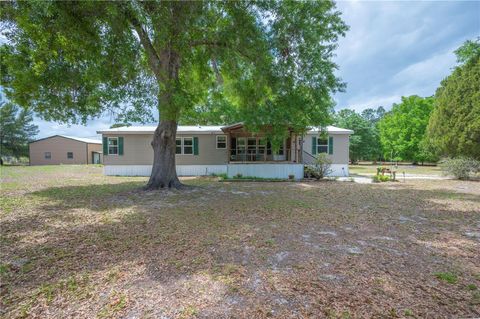 Photo of 16470 Crash Creek Road, Polk City, FL 33868 (MLS # P4938291)