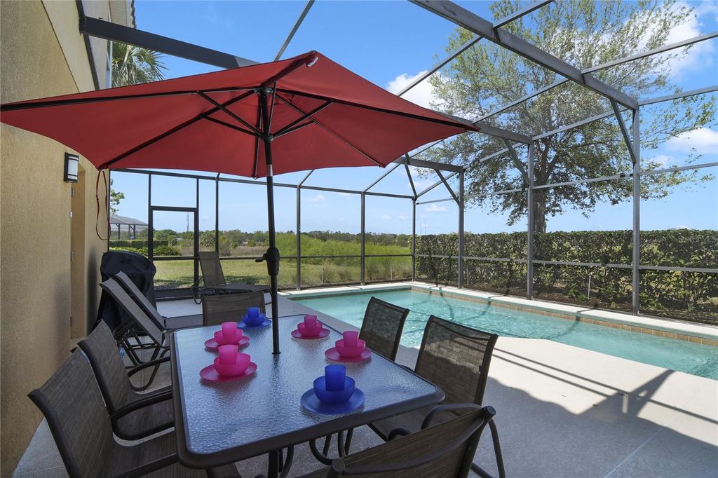 Photo of 4115 Oaktree Drive, Davenport, FL 33837 (MLS # O6393813)