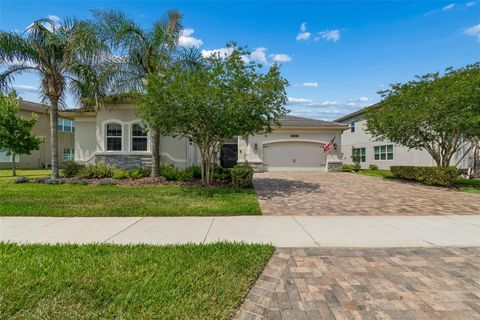 Photo of 2213 Hollow Forest Court, Wesley Chapel, FL 33543 (MLS # TB8508124)