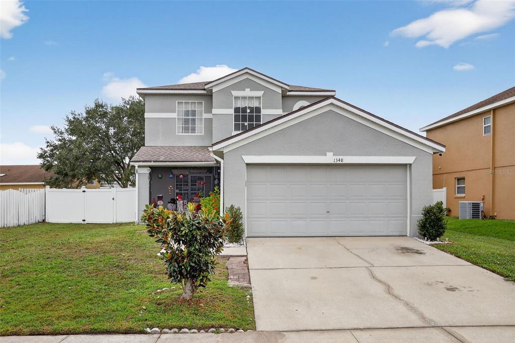 Photo of 1348 Heather Lake Drive, Orlando, FL 32824 (MLS # O6366562)