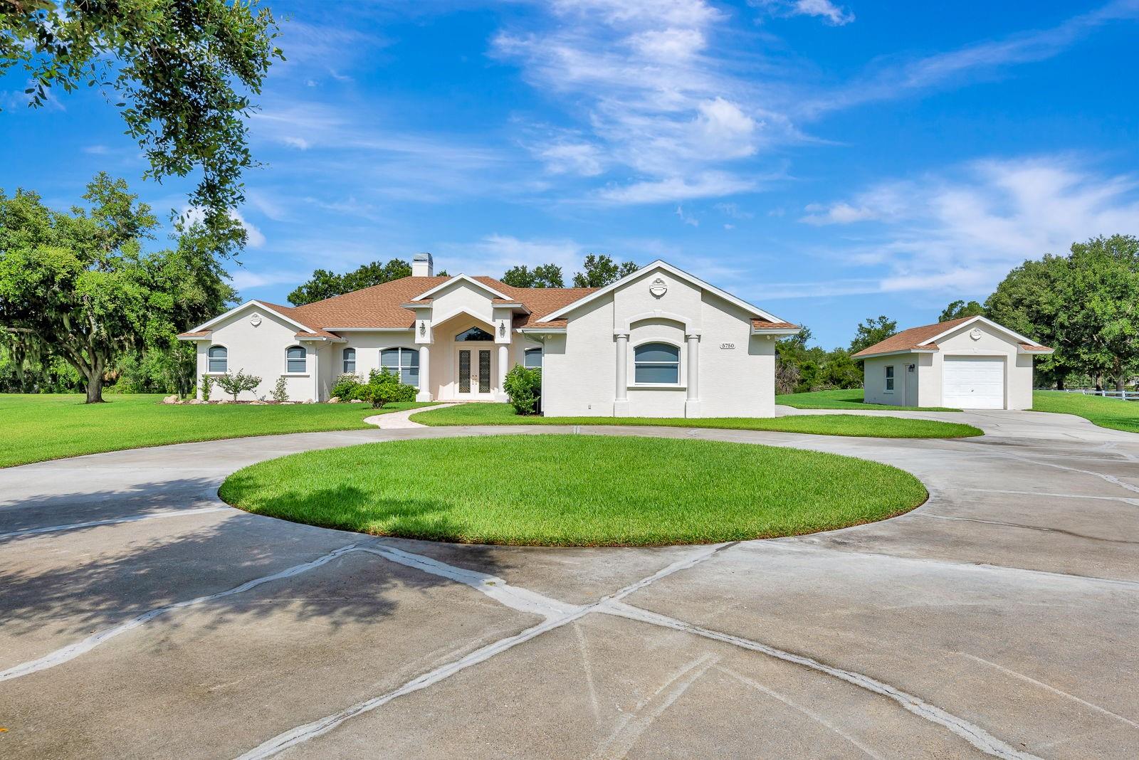 Priced to Sell $35,000 reduction in price for 5 acres in Sarasota the search is over here is your peaceful oasis. This beautifully maintained property just became even more attractive, offering the perfect opportunity to own a piece of paradise at a newly reduced price. Seller has also had the trim painted to neutral color June 17 - the Blue trim is now cream but wait there is more SELLER IS OFFERING SELLER CONCESSIONS with acceptable purchase price - Use for 2/1 Rate Buy Down, Permanent Rate Down or Closing Costs. Property gives you the space and tranquility you have been searching for on 5 acres, while being a short drive from the heart of Sarasota and the Gulf Beaches. If you have been dreaming of green acres and the farm life here is your opportunity. This spacious home has 3 bedrooms and a den offering plenty of space for family and guests. The open layout provides a comfortable living and dining space, perfect for quiet evenings or entertaining. There are scenic views from your large backyard, ideal for outdoor activities, pool time or simply relaxing in nature. Solar panels heat the inground saltwater pool. AC 2022, Water Heater 2022, Roof 2 years old Transferrable Roof Warranty 2035, All appliances less than 5 years old, Water Softener 2021, Garage Door Openers 2022, Conduit is Run for a pond Fountain, All downspouts on house are connected and run to back pond, Sprinkler System 2022, New LED Fixtures, Pool pump and pool filter 3 months old. Saddle Creek Estates is high and dry no flooding here and horses, alpacas, llamas, miniature donkeys and 6 chickens are allowed. Privacy, peace and quiet you can escape to your mini estate without sacrificing shopping, dining and top-rated schools just minutes away. Properties like this only 5 miles to interstate don't come on the market very often book your tour and start living the country life.