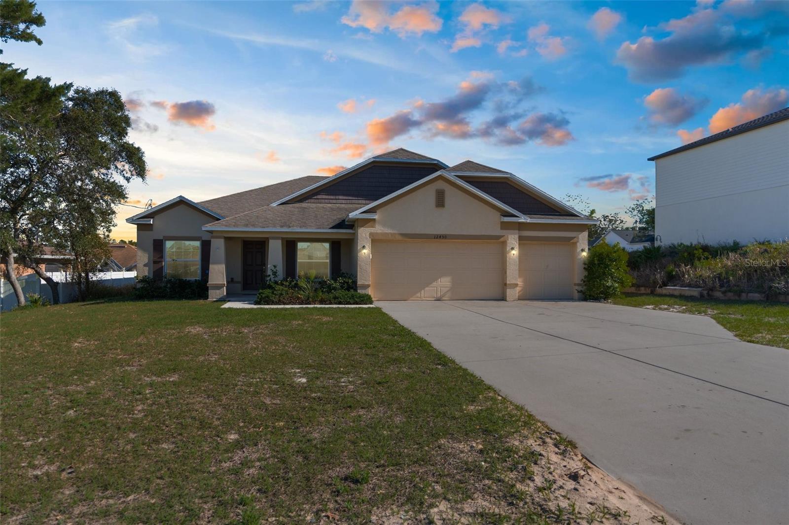 Priced below appraised value!!! Don't miss this stunning 6-year-old 4-bedroom, 3-bathroom with Den/Office/5th bedroom home! *Now OFFERING an INTEREST RATE REDUCTION for the first 12 months at no cost to the buyer when using preferred lender - saving thousands! * Upon entering, you'll be welcomed by tile floors, large rooms, abundant natural light, and modern ambiance. The front of the home features a study adorned with French glass doors perfect for an office/den/5th bedroom. The primary suite is generously sized and filled with light, while the primary bathroom serves as a private retreat, complete with a dual vanity, a sizable walk-in closet, and a luxurious walk-in shower featuring frameless glass doors and three shower heads. The remaining three bedrooms are also spacious and offers plenty of closet space. The kitchen boasts granite countertops, an abundance of cabinet storage, and a pantry for added convenience. The large living room is ideal for entertaining guests or simply unwinding. This home is further enhanced by a laundry room and a three-car garage. After a long day, unwind in the screened-in lanai off the eat-in kitchen.
FRESHLY PAINTED INTERIOR 2025, NEW VINYL PLANK FLOORING IN ALL BEDROOMS 2025. Sellers are offering a generous credit at closing towards buyers closing costs and prepaids with a full price offer. Call today before this opportunity slips away!