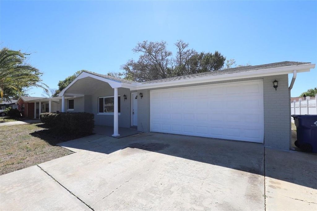 Photo of 7144 Fairfax Drive, Port Richey, FL 34668 (MLS # TB8435938)