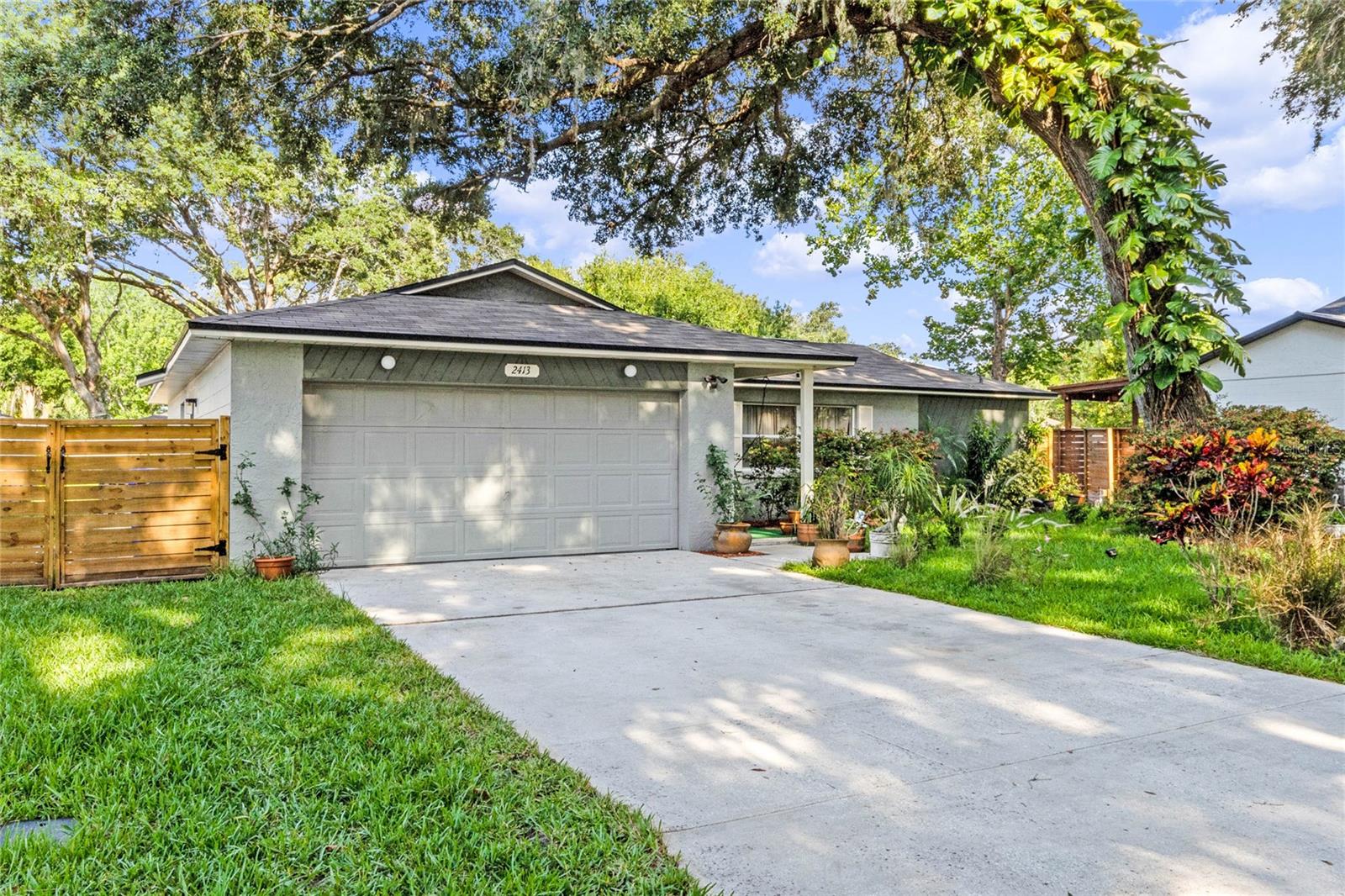 One or more photo(s) has been virtually staged. This beautiful home boasts mature landscaping that enhances its curb appeal. The front yard is adorned with well-manicured lawns, vibrant flower beds, and tall, mature trees that provide shade and privacy. The exterior of the house features a fresh coat of paint from 2018, giving it a modern and well-maintained appearance.As you step inside, you are greeted by a cozy and inviting atmosphere. The floors throughout the home have been recently updated, providing a stylish and durable foundation. The living spaces are designed to be comfortable and welcoming, with a neutral color palette that complements any decor style.The kitchen has been updated within the last five years and features modern fixtures and appliances that make meal preparation a breeze. The countertops are sleek and durable, and there is ample storage space for all your culinary needs. It's a perfect space for cooking and gathering with family and friends.The guest/primary bathroom has undergone a significant renovation, resulting in a modern and inviting space. It features contemporary fixtures, a stylish vanity, and a luxurious juzacci tub, offering a spa-like bathing experience.In terms of maintenance and updates, the air conditioning unit and water heater are approximately 1-1/2 years old, ensuring a comfortable indoor climate and reliable hot water supply. The roof is relatively new, being only 1-1/2 years old, providing protection and peace of mind.Both the interior and exterior of the house have been recently painted, with the interior showcasing a clean and updated look throughout. This fresh paint adds to the overall appeal of the home and creates a cohesive and well-maintained aesthetic.Overall, 2413 Oak Run Blvd offers a beautiful and inviting home with updates and upgrades that enhance its functionality and visual appeal.