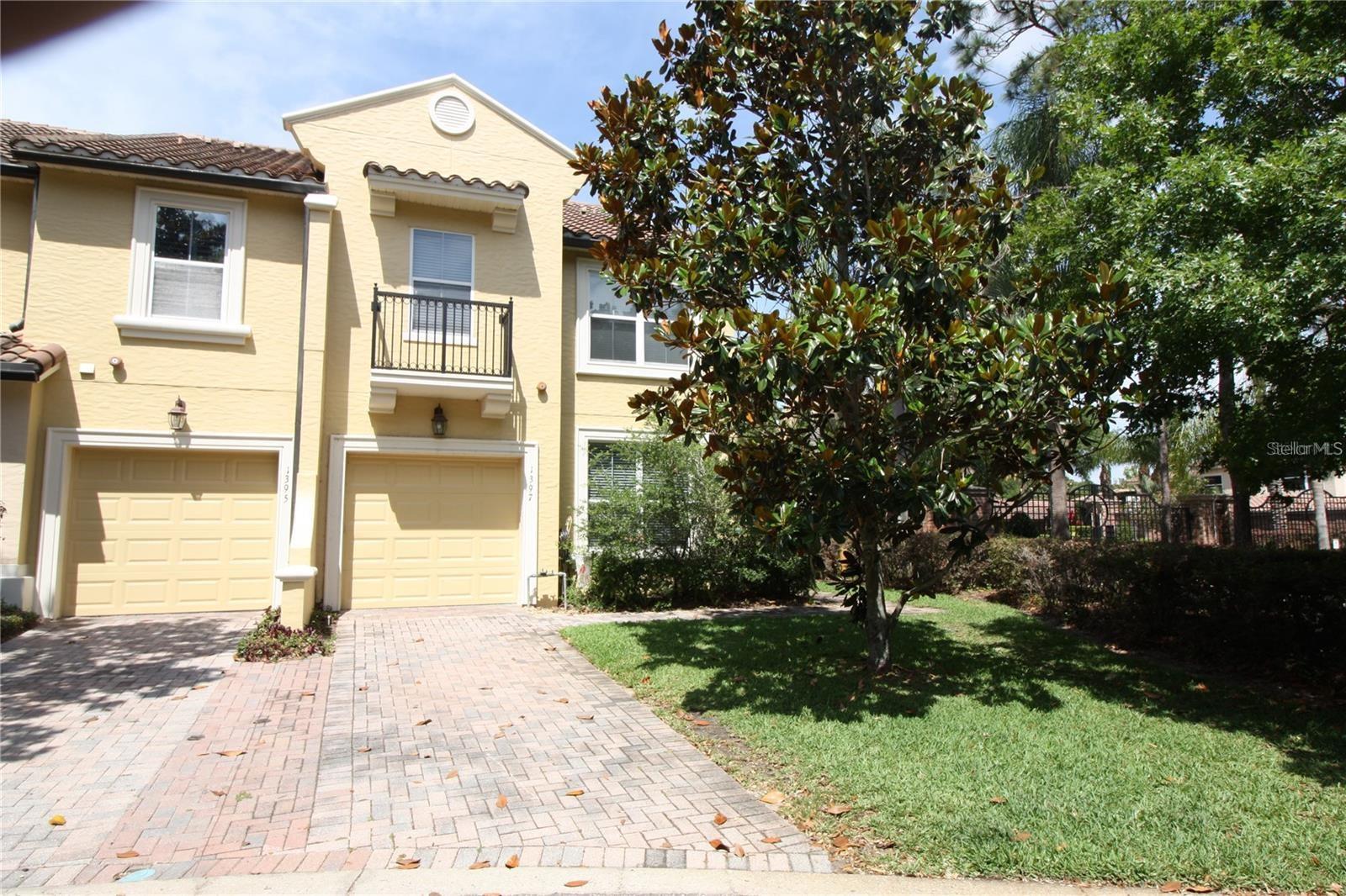 This luxurious end townhome unit, is a Tuscan-stye townhome in this upscale gated, lake community , “Montacino” in a very desirable section of Maitland. 3 bedroom, 2 ½ bath with office/den and a second floor loft.. The spacious primary bedroom has a walk in closet and a set of French doors which lead out onto the upstairs private Lanai. The on-suite is large, with garden tub, shower and his and hers sinks. The loft is open space with a laundry closet with both washer/dryer. First floor has a gorgeous kitchen with designer cabinets and granite countertops, a walk-in pantry and a private rear Lanai , great for you morning coffee break. Beautiful hardwood floors throughout the downstairs, a great many storage options, and an attached 1 car garage. This community/property were past winners of the Parade of Homes, and this specific home was the main model. This home is located in the community directly across from the pool. Community is very easy access to I-4, shopping and major roadways.