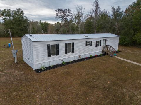 Photo of 11910 NE 103rd Terrace, Archer, FL 32618 (MLS # GC533580)