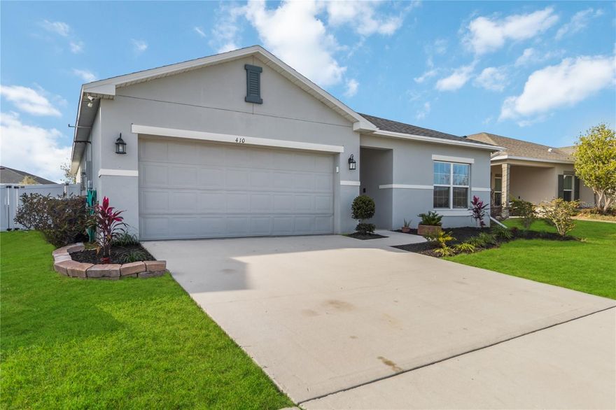 Immediately available and the one you’ve been waiting for! This recently built 2020 single-story home features a paid-off solar system, offering energy efficiency and long-term savings. The AC was updated in 2023 to a higher efficiency unit as well. The home offers 4 bedrooms, 2 bathrooms, and a 2-car garage, all thoughtfully designed on one level. Enjoy a fully fenced backyard, a screened-in porch, and a generously sized yard—perfect for relaxing or entertaining. Inside, the home greets you with luxury vinyl plank flooring and tile throughout. Three bedrooms are conveniently located on one side of the home, while the private primary suite is situated on the opposite side for added privacy. The open-concept layout seamlessly connects the kitchen, living room, and dining area, creating an inviting space ideal for everyday living and gatherings. This home shows like a model and is truly move-in ready. Located just minutes from shopping, dining, and entertainment, this efficient newer home also features a very low HOA of only $200 semi-annually. A must-see to fully appreciate—schedule your showing today.