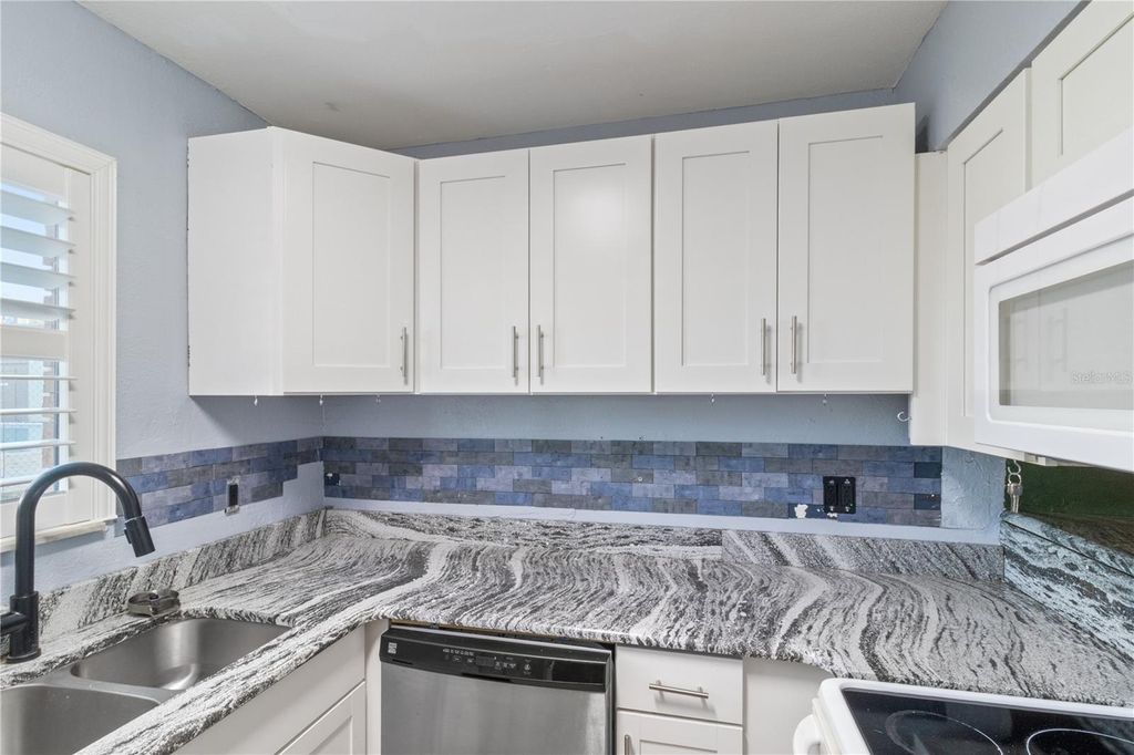 Photo of 1836 N Crystal Lake Drive, Lakeland, FL 33801 (MLS # L4959500)