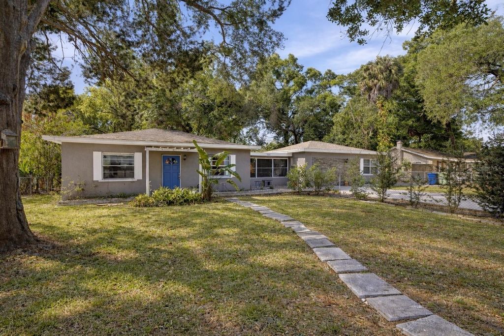 Photo of 1709 NE Lambright Street, Tampa, FL 33610 (MLS # TB8493158)