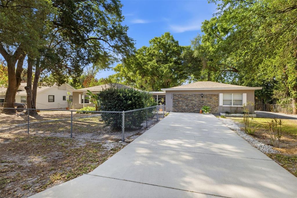 Photo of 1709 NE Lambright Street, Tampa, FL 33610 (MLS # TB8493158)