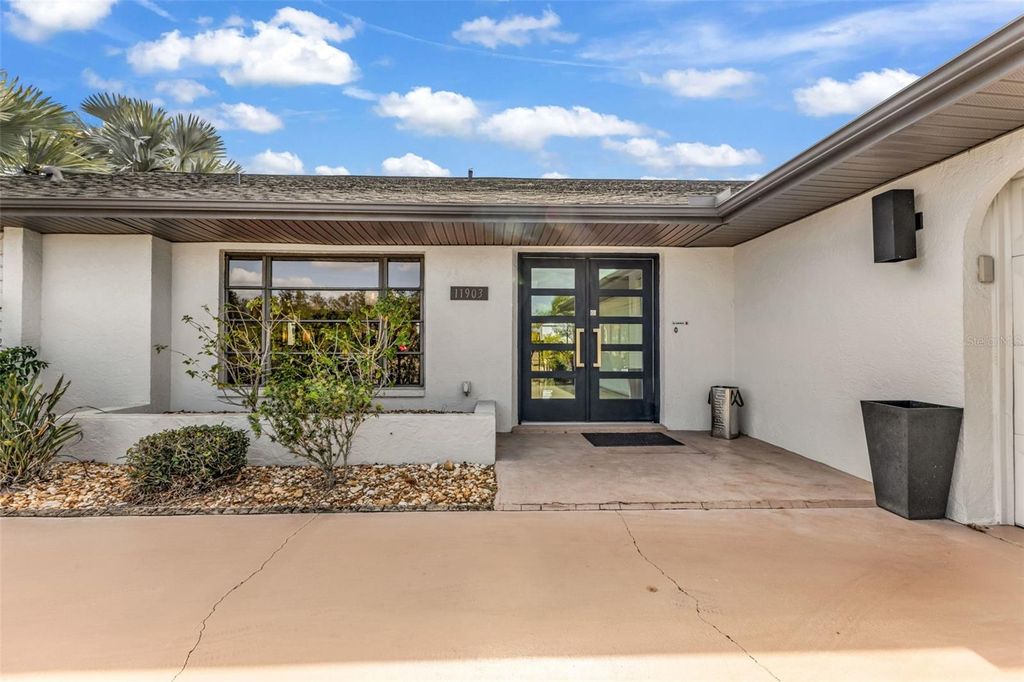 Photo of 11903 SW Kingsway Circle, Lake Suzy, FL 34269 (MLS # C7520713)