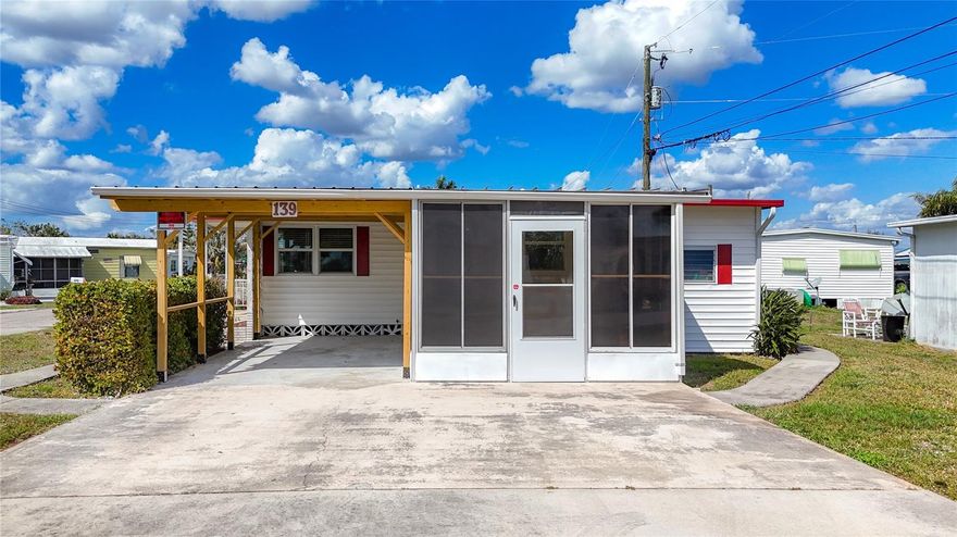 Are you looking for an affordable winter home, a new permanent home, or an investment property in Southwest Florida?  This 2B/1B home with a half bath and enclosed lanai is for you! The kitchen features a gas stove and eating space with a snack bar. The master bedroom has his/her closets and office space that goes out to the lanai.  New Roof (2022) and the carport was recently rebuilt.  The home is in MOBILE MANOR, a friendly community of seasonal and year-round residents.  There are no lot fees, and you own the home's land.  Conveniently located near shopping, dining, parks, and easy access to I-75, RSW International Airport, and our world-famous beaches.  This property is being sold AS IS.  Make an appointment today!