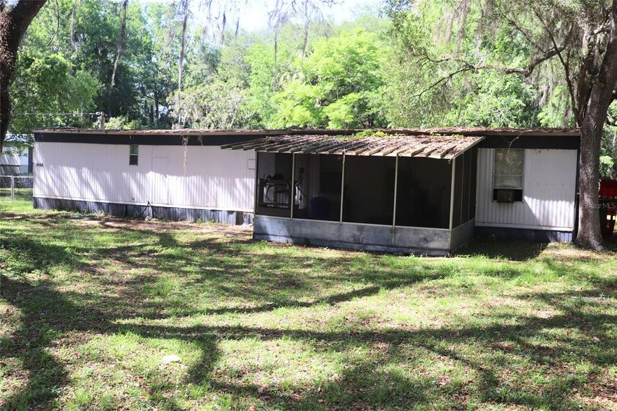MOTIVATED SELLER!  
Just listed in the heart of Lake Panasoffkee—an area known for its A-rated elementary school, great local restaurants, and a beautiful spring-fed lake famous for trophy largemouth bass, bluegill, sunfish, and catfish. This location offers the perfect blend of quiet rural living with quick access to I-75, making trips to Inverness, Ocala, and The Villages a breeze. 
Enjoy the true Lake Pan lifestyle with Coleman Landing Public Boat Ramp just minutes away, along with nearby marinas and some of the area’s best fishing and boating spots recreation.  
This property is a great investment opportunity featuring a 2-bedroom, 2-bath split-plan, front lanai, chain-link fenced backyard, NO HOA, not in a flood zone, and a large storage shed plus a newer back deck. Whether you're looking for a full-time residence, rental potential, or a weekend getaway near the lake, this home checks the boxes.

Property is being sold in as-is condition.