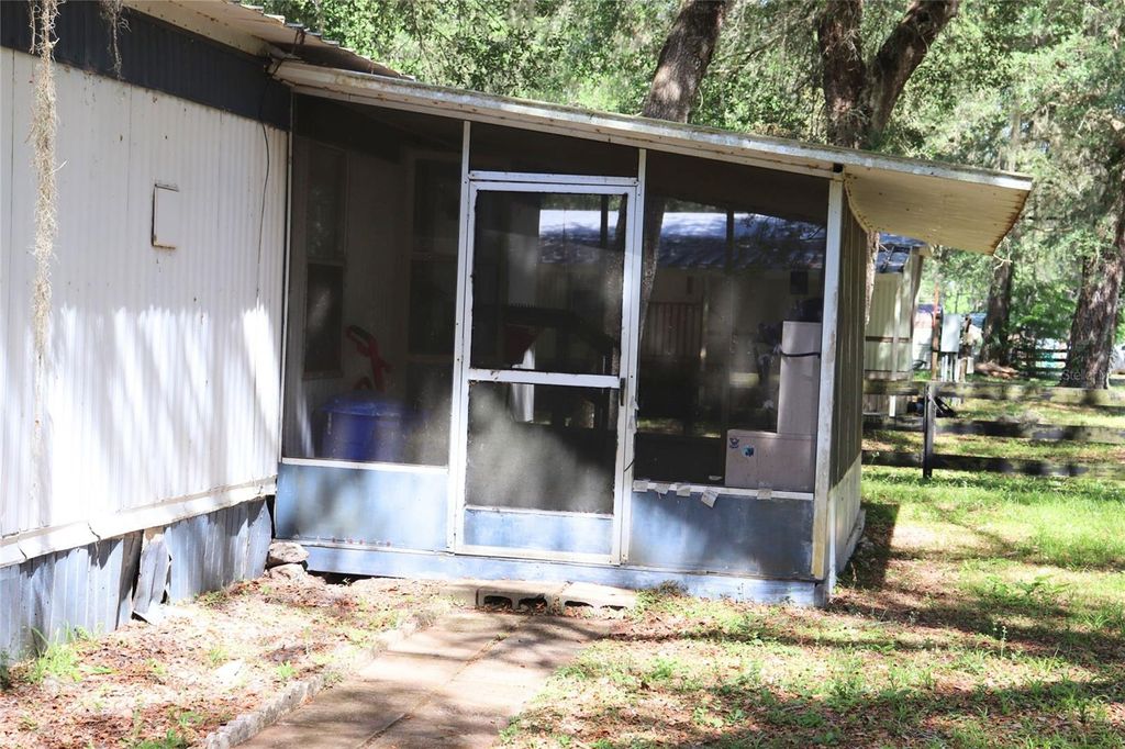 Photo of 2466 Cr 401a, Lake Panasoffkee, FL 33538 (MLS # A4690801)