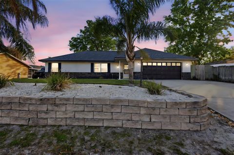 Photo of 929 Fort Smith Boulevard, Deltona, FL 32738 (MLS # NS1087723)