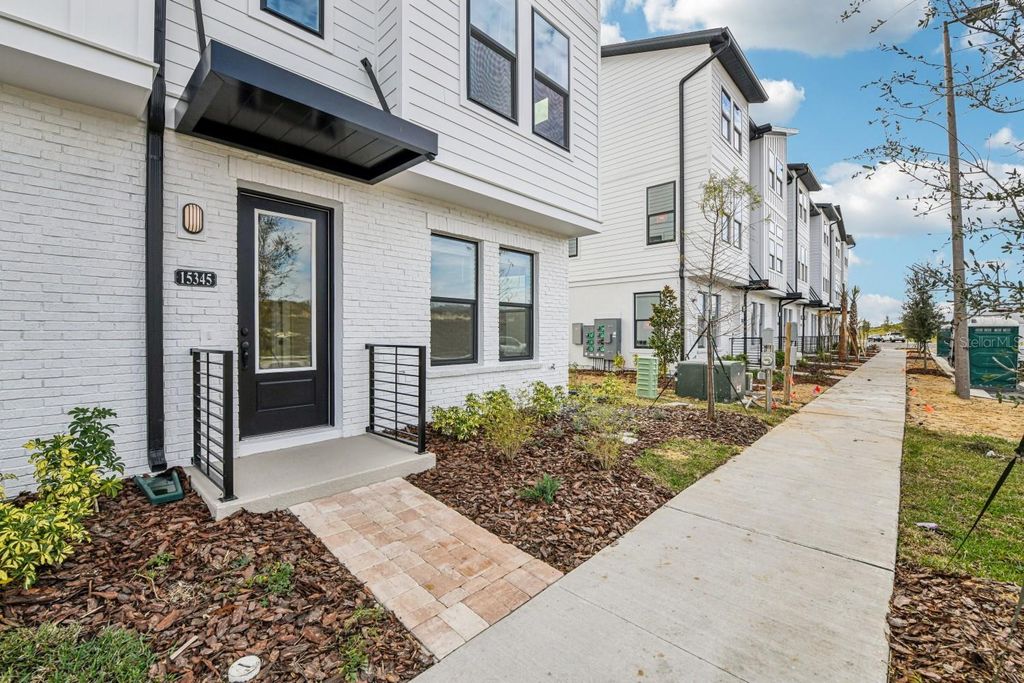 Photo of 15345 Hamlin Park Drive, Winter Garden, FL 34787 (MLS # TB8461483)