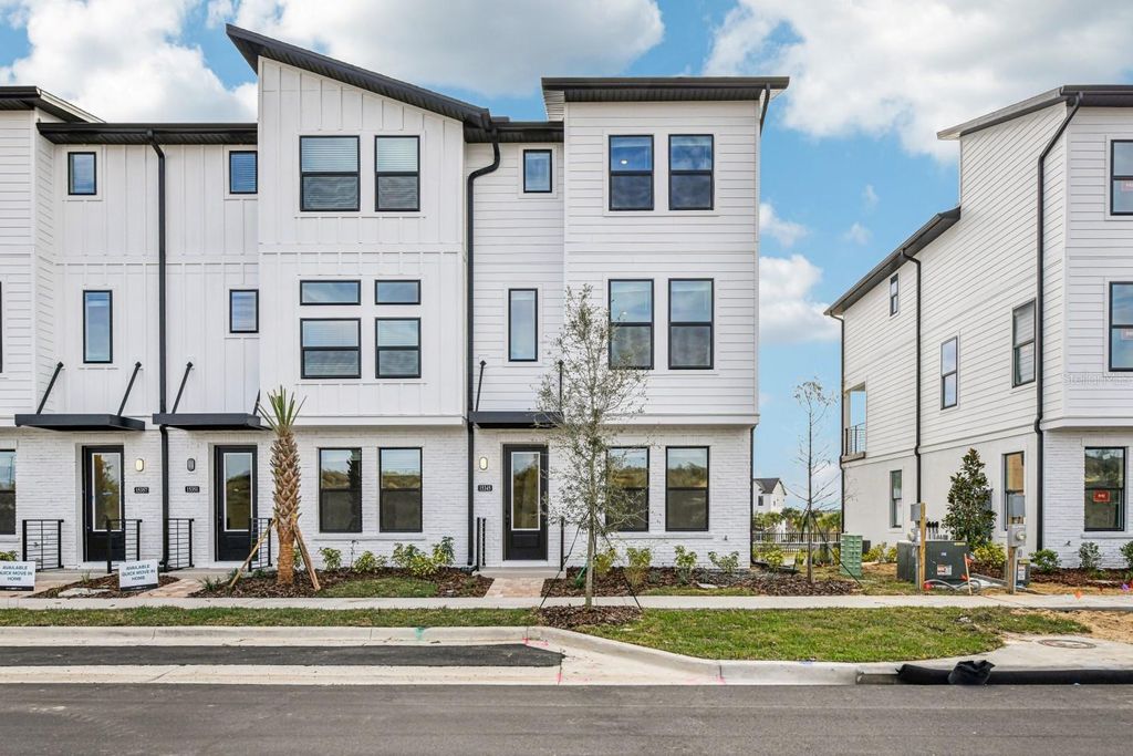 Photo of 15345 Hamlin Park Drive, Winter Garden, FL 34787 (MLS # TB8461483)