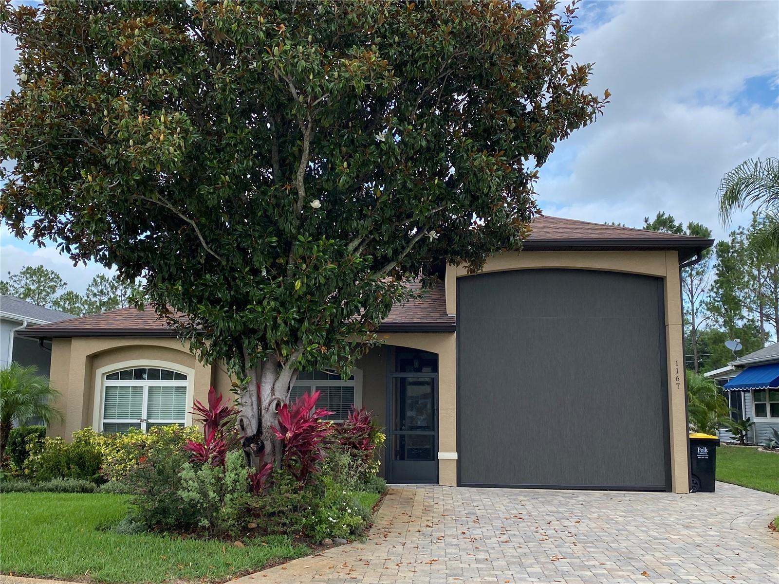 Welcome to your dream home in the highly sought-after RV community of Mt. Olive Shores North. This stunning 2 bedroom, 2 bathroom offers the perfect blend of comfort, elegance and functionality. The open concept floor plan flows seamlessly from the moment you enter, offering a warm and inviting space for everyday living and entertaining. The spacious primary bedroom features dual closets, and a luxurious en-suite bath with double sink vanity and a tiled walk-in shower. The RV Port measures 49 x 14 with motorized sun shades to protect your coach from the Florida sun. The home has a lovely screened lanai in the back, surrounded by a fenced yard and absolutely beautiful landscaping. An ideal Florida lifestyle, perfect for morning coffee and entertaining in the evenings. Mt. Olive Shores North is a 55+ gated RV community with 2 clubhouses, pools, spa, and an active social calendar.
This home is a must see and ready for move-in. Schedule your appointment today!