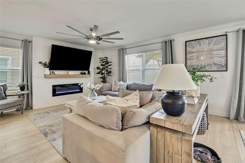 Photo of 9188 Forge Breeze Loop, Wesley Chapel, FL 33545 (MLS # O6310957)