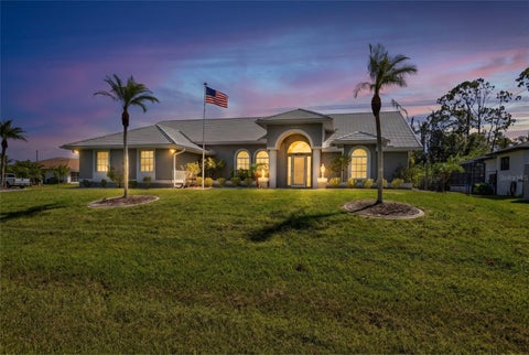 Photo of 5184 Ellsworth Terrace, Port Charlotte, FL 33981 (MLS # C7532252)