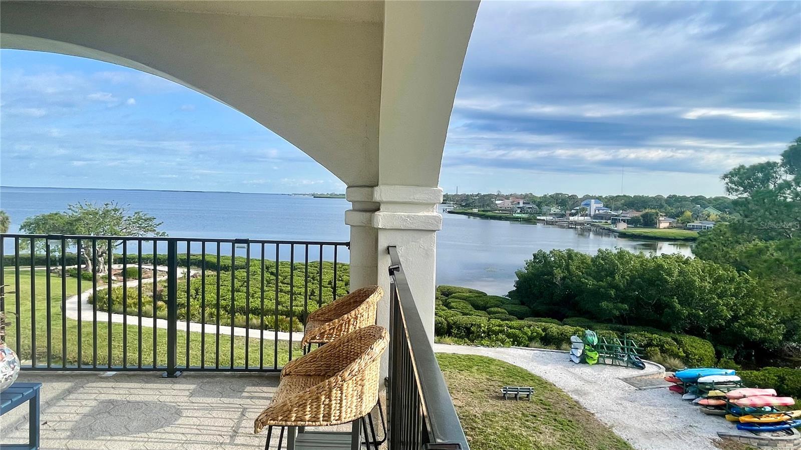 What do you get with this panoramic view of the Gulf, looking out at Howard Park and Sunset Beach? PENTHOUSE! What was two top floor units is now a true 4 bedroom/4 bath condo on the top floor, fully gutted down to the cinder blocks and renovated with new electrical, plumbing, 8 sliders, 2 windows, insulation and walls. This renovation included adjustments to the floor plan to allow for maximum spacing and views from each room. Spacious kitchen with large island (Blue Pearl granite) easily fitting 5-6 stools, with a large dining room capable of seating 25 people, and views of the preserve and mangroves (this area can never be built on). A sitting area with access to the balcony with the first of three (3) 6x6 air conditioned closets on the balconies. Porcelain 2x4 tiles and high quality laminate flooring throughout. A master bedroom with access to the balcony, two closets, a large bathroom with granite countertops, double vanity, and a walk in shower. Bedroom 2 is large and has amazing views of the mangrove/preserve with a bird sanctuary. Bedroom 3 has access to the 50 foot wrap around the balcony where you will find 2 more air conditioned 6x6 closets. Bedroom 4 - seen as an office, is a large bedroom with an on-suite bathroom and amazing views. Boat slips are available at neighboring Tarpon Cove! Milestone inspections have been completed and passed. The reports are available upon request.