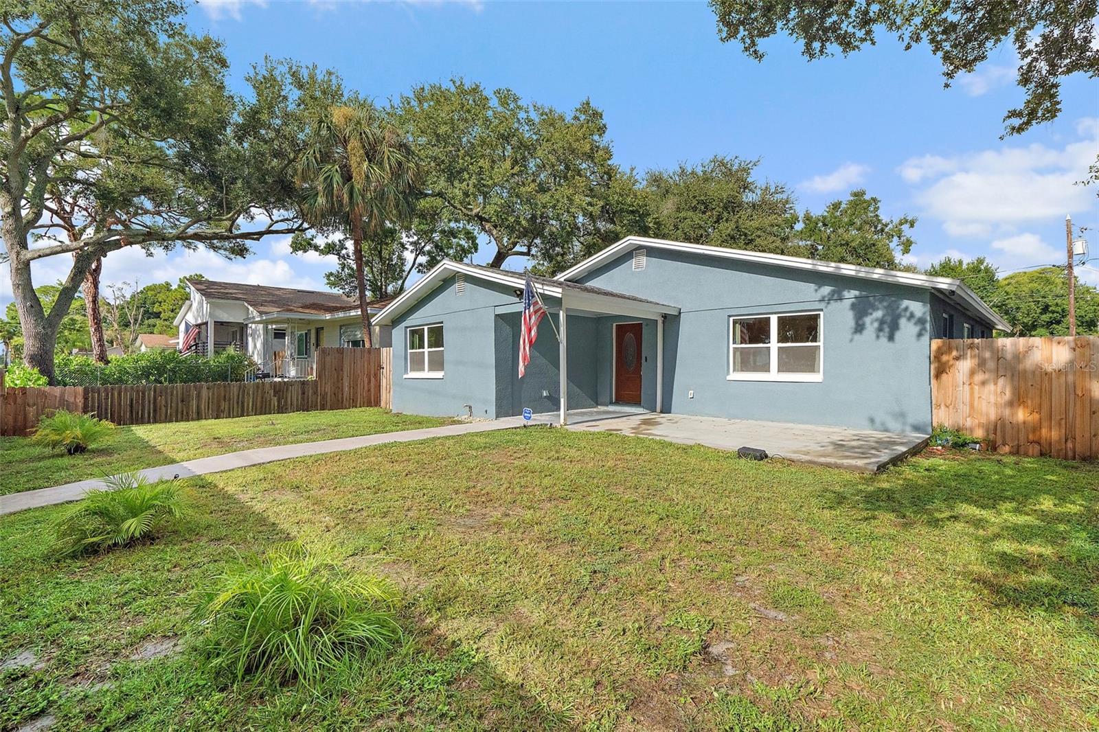 Beautifully renovated home in the heart of St. Pete.This move-in ready 3-bedroom, 2-bath property blends modern updates with everyday comfort, featuring an open layout, stylish finishes, and plenty of natural light. The spacious living room offers a comfortable gathering space with updated flooring and recessed lighting throughout. The sleek style kitchen is equipped with marble countertops and backsplash, with stainless steel appliances. Three well-appointed bedrooms provide comfortable retreats, including a primary suite with its own walk-in shower finished in marble tile and frameless glass. The bathrooms are fully updated, with the primary bath showcasing a dual vanity, sleek fixtures, and a large spa-style shower, while the second bath features gold hardware, and contemporary tile. Additional highlights include modern flooring, updated fixtures, and a move-in ready condition. Conveniently located across from Lake Maggiore, just minutes from Downtown St. Pete, Gulf beaches, and major highways, this property is ideal as a permanent residence or investment opportunity.
