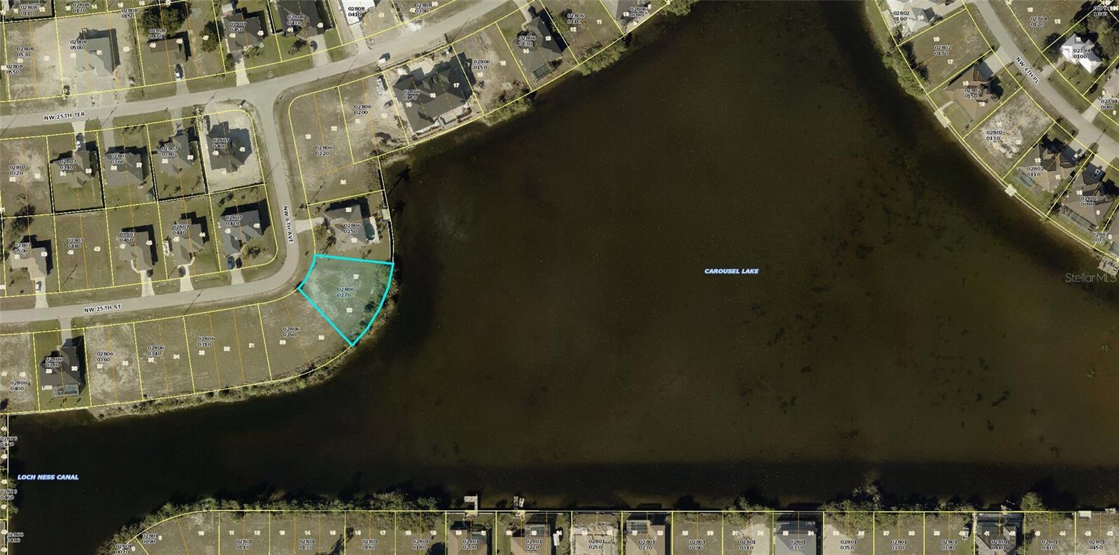 Rare find! Oversized lakefront residential lot with 148 feet of water frontage! Not in a flood zone! Discover the perfect canvas for your dream waterfront home with this exceptional lot nestled on the expansive Carousel Lake with unobstructed water views. Positioned on a quiet side street with easy access to I-75 and US41, ensuring quick connectivity to Fort Myers & Charlotte County. Situated just minutes from Burnt Store Marina, Crystal Lake Park and the upcoming Seven Seas Resort, as well as nearby parks, golf courses, boat ramps, dining, and shopping options. Whether you're an avid boater, nature enthusiast, or seeking a peaceful retreat, this lot provides the ideal setting to bring your vision to life in one of Cape Coral's most sought-after locations.