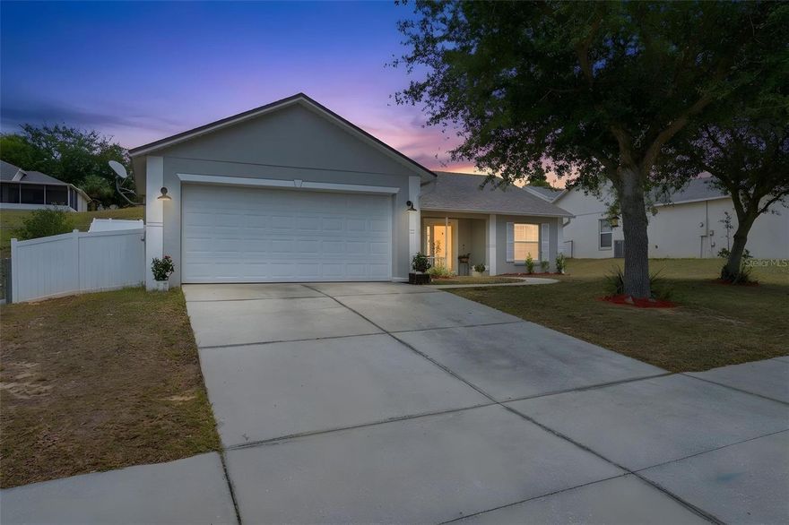 Welcome home to 812 Shore Breeze Way located in the highly desirable Minneola neighborhood of Quail Valley. Front porch charm with sunset views in a beloved neighborhood that's tucked perfectly away from the hustle and bustle, yet conveniently close to everything! Here you will find this adorable 3 bedroom, 2 bath home, featuring a popular split bedroom layout. Inside, you'll be greeted with high ceilings and no carpet, offering both style and easy maintenance. Open living areas flow seamlessly into the kitchen, complete with counter seating, plenty of cabinets for storage and sliding doors which lead out to the covered back screen porch - making it ideal for everyday living and entertaining. The split bedroom layout provides added privacy and well-sized secondary bedrooms. Your primary bedroom is spacious with a large walk-in closet. Primary ensuite offers a soothing garden tub perfect for relaxation plus a separate walk-in shower. Interior laundry room - includes the washer and dryer! Backyard is spacious and fully fenced with privacy vinyl fencing. Located in Quail Valley, an established neighborhood known for its low HOA and neighborly feel, residents can enjoy sidewalk lined streets, a community playground and a picnic area. You will appreciate the location of top rated schools and is conveniently tucked away, yet just under a half mile to access HWY 27, and you're close to everyday essentials like Anytime Fitness, coffee shops, Walgreens, CVS, and a variety of dining options -just 3 miles to Downtown Clermont! Several updates have been completed to include a new Roof (2020), HVAC (2021), new Water Heater (2021). Homes in this community don't last long! Call me to get your private showing scheduled today!
