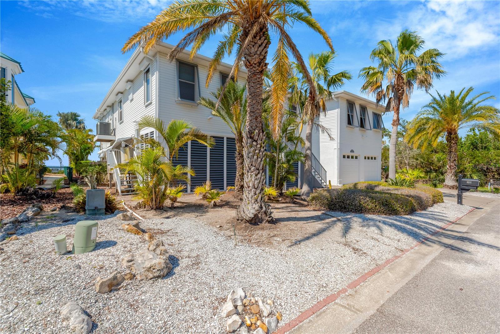 NOW is your opportunity to own this masterfully designed architectural custom built home on the Gulf of Mexico in beautiful Tarpon Spring, Florida. The home features 90 feet of open water views, park like grounds, low maintenance landscaping, wrap around screened enclosed porch and total privacy. Its like being on vacation every day!!
Gulf front property on a quiet cul-de-sac, bordering Fred Howard Park with close access to both Clearwater and Tampa.
If you dream about year-round vacation lifestyle, this is your best option, providing both privacy and a dream location between two sandy beaches, Fred Howard Park Beach and Sunset beach.
This custom designed property takes full advantage of the unobstructed panoramic open Gulf views, spectacular sizzling sunsets, all amenities of Fred Howard Park, proximity to Three Rooker Island, Anclote Key Preserve State Park, Honeymoon Island State Park and waters of St. Joseph Sound.
Fabulous open floor plan with walls of high impact glass that bring the outside in with unsurpassed views of the lush tropical back yard, pool, sunsets and Gulf. Elevator access at ground floor entry.
Immaculate in every way, this custom home enjoys a bamboo entryway, high 10 ft ceilings, tray ceilings, ceiling fans, plant shelves, Bamboo floors, crown molding in every room, plantation shutters, central vacuum, security system, solar shades, 36ft covered deck with glass see through railings. Elevator! Island kitchen, custom architecture, granite countertops. The home has so many amenities to simplify daily life.
Monogram 6-burner gas oven, monogram professional vent hood, built-in Sharp Insight Pro microwave drawer, Bosch dishwasher, reverse osmosis system.
Opulent Gulf front master-suite with adjoining office/sitting room, walk-in closet. Master bath w/whirlpool jet tub & walk-in shower. Top of the line salt water pool, solar heated with back up heat pump for cooler weather, descent waterfalls, therapy jets, benches & pop up automatic cleaning system. All new pumps and filter installed in October 2024.
Sun & shade areas are abundant, deck for laying out by the pool, brick pavers, tropical landscaping, Gazebo. Dock!
One-of-a-kind waterfront 91' x 170' lot.
Constructions amenities include 2x6 walls, screened first and second floors patios, first floor patio restroom, 50 year roof, elevated platform mounted two AC units (2018), newer water heater (2021), lighting rod system, built to 2002 Florida Statewide hurricane building code, built 3ft above FEMA codes, Bahama shutters on the east wall and motorized and manual hurricane shutters on south, west and north walls, oversize garage & pool with high elevation. Home did not flood during past 2 hurricanes.