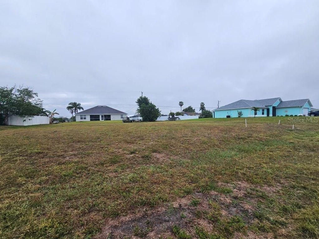 Photo of 2129 NE 19th Place, Cape Coral, FL 33909 (MLS # TB8365962)
