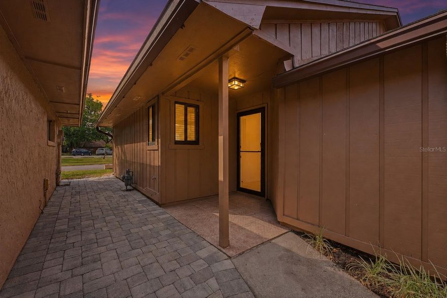 Welcome to the desirable Pinetree Village section of Deer Run, where comfort, convenience, and sunny Central Florida living all come together beautifully. This 2 bedroom, 2 bathroom townhome has the kind of feel buyers love the moment they walk in — bright, welcoming, and easy to imagine as home.

Inside, the high ceilings help create an open and airy feel, while the natural light brings warmth into the main living space. The beautiful rock gas fireplace adds the perfect touch of character and creates a cozy focal point for relaxing evenings at home.

The kitchen offers a great layout with a breakfast bar, making it perfect for casual meals, morning coffee, or chatting while dinner is being made.

Step outside to your private patio — a sweet little spot to sip your coffee, unwind after a long day, add cozy seating, or enjoy a quiet evening under the Florida sky.

You’ll also love the everyday conveniences this home offers, including inside laundry, a covered carport, and an attached one-car garage with extra storage space.

Pinetree Village is a well-maintained community with amenities that make it easy to enjoy where you live, including a community pool, pickleball courts, basketball courts, and two miles of sidewalk trails right outside your door. You can even walk to Sterling Park Elementary School.

The location is another big win — close to shopping, restaurants, Winter Park, and State Road 417, making commuting and weekend plans simple.

Comfortable, inviting, and full of charm — this townhome is ready to welcome its next owner home.