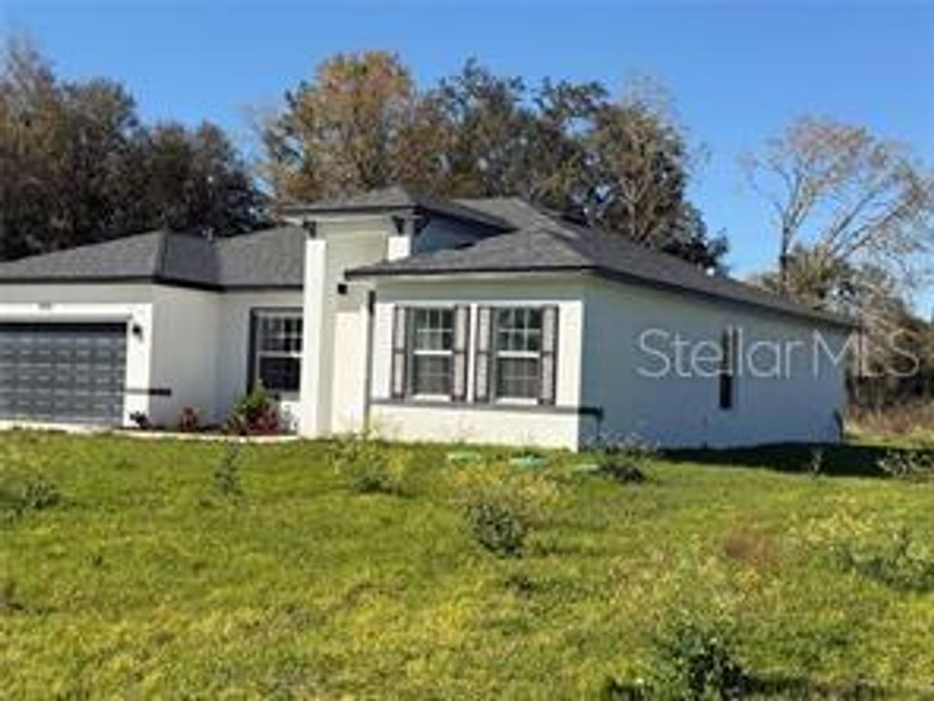 Photo of 5981 SW 154 Place, Ocala, FL 34473 (MLS # O6390024)