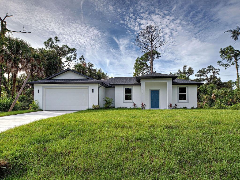 Photo of 13547 Ketridge Avenue, Port Charlotte, FL 33953 (MLS # C7515020)