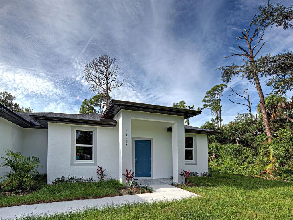 Photo of 13547 Ketridge Avenue, Port Charlotte, FL 33953 (MLS # C7515020)
