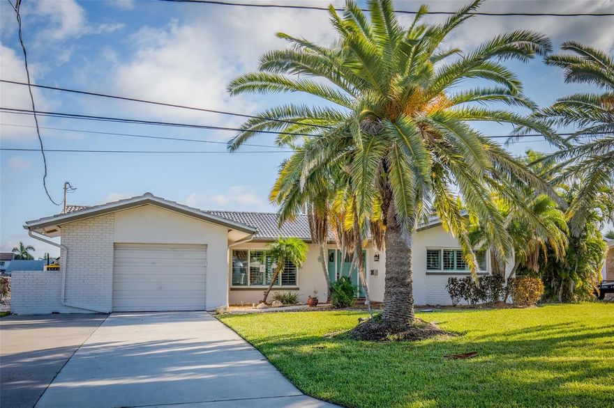 BEAUTIFUL WATERFRONT HOME FOR RENT! Located in the highly praised Three Palms Point subdivision of St. Pete Beach, this 3-2 single family house brings an exciting beach locale to quiet neighborhood living. Only 0.7 miles to the nearest public beach access for the area's breath-taking gulf beaches and unbeatable sunsets. Stunningly landscaped, this home has been recently remodeled with quartz counter tops and new kitchen cabinets. Gorgeous intracoastal water views with a private fishing dock. Large living room, spacious kitchen and dining area, primary bedroom has a walk-in closet, two guest bedrooms, two full bathrooms, and an in-ground pool! Attached one-car garage. Hook-ups available in garage and inside the house for washer and dryer. Landlord will maintain pool and A/C. Tenant must maintain yard and shrubbery. One pet is allowed, non-refundable pet fee applies. Schedule your showing today!