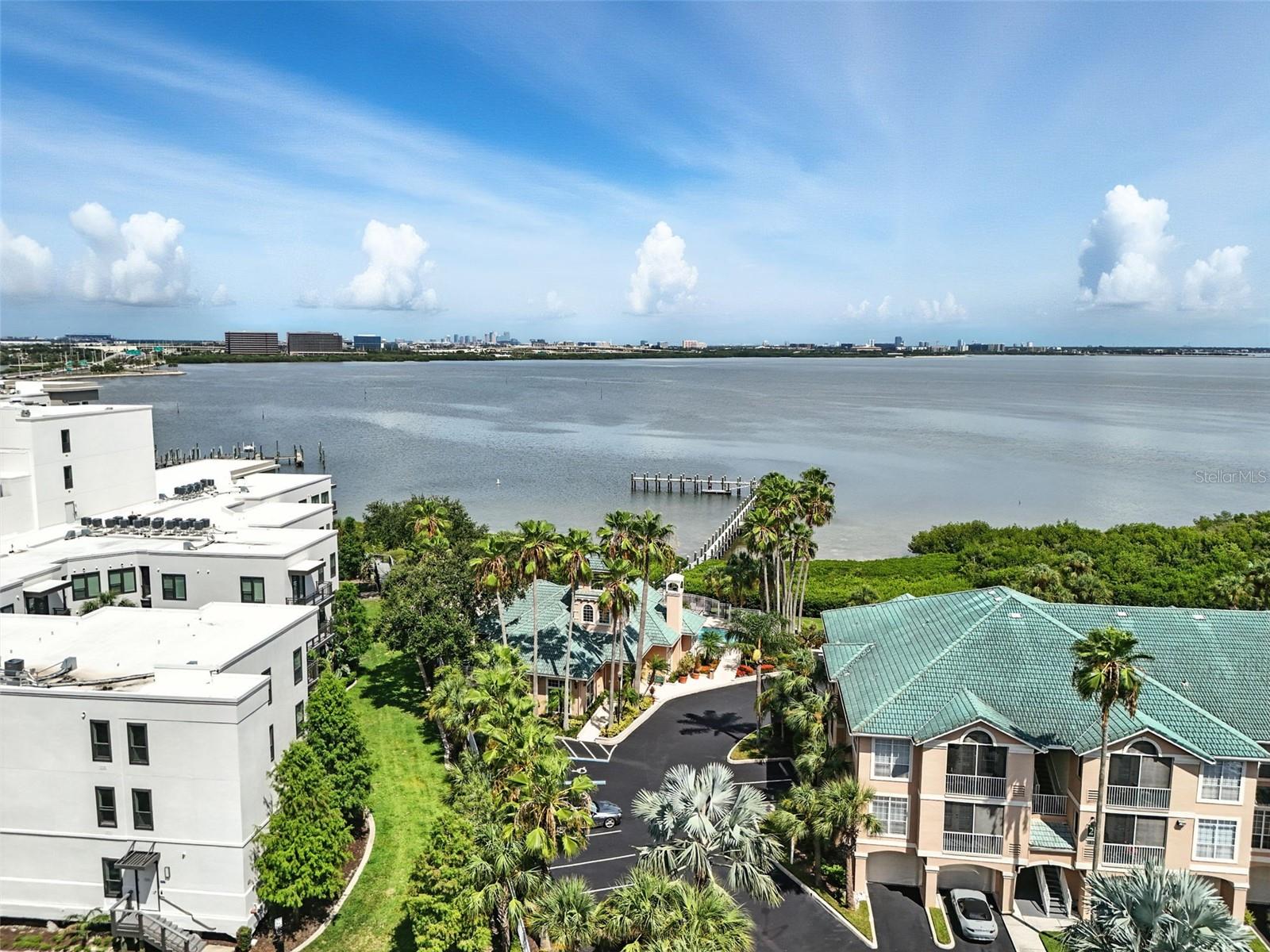 Live Where Every Day Feels Like a Getaway!
If you’ve been dreaming of a low-maintenance lifestyle with resort-style amenities and an unbeatable Tampa Bay location—this is the one!
Welcome to 1103 Bay Club Cir—perfectly located in the gated Island Club at Rocky Point community, where convenience meets coastal living. Just minutes from downtown Tampa, shopping, dining, sporting events, and Tampa International Airport, this condo also offers quick access across the bridge to St. Pete and some of Florida’s most beautiful Gulf beaches. Whether you're heading out for work, play, or travel, everything you need is close by.
This first-floor condo offers easy access and a bright, open layout with tile flooring throughout the main living areas. The kitchen is both stylish and functional, featuring stone countertops, all appliances included, and ample cabinet space for storage and prep. From the spacious great room, French doors lead to a screened lanai—your own private retreat to sip coffee and enjoy the Florida breeze. There's even a bonus storage closet on the lanai for added convenience.
The smart split-bedroom floorplan gives everyone space and privacy. Both bedrooms offer walk-in closets, with the primary suite featuring a private bathroom. The secondary bath is roomy and well-designed, with plenty of counter space. You'll also appreciate the in-unit laundry room with washer and dryer included, plus a private garage just steps from the front door and an additional storage unit.
This condo has been freshly painted in 2025 and features a brand-new water heater (June 2025)—making it move-in ready with peace of mind. And beyond the home itself, the community amenities are something special. Enjoy the resort-style pool, hot tub, sauna, and fitness center, tranquil biking/walking trails, plus a community dock where you can take in the views, cast a line, or launch a paddleboard to explore the surrounding waters.
Even better, the monthly HOA covers flood insurance, cable, and internet, making for a low-maintenance lifestyle in one of Tampa Bay’s most desirable areas.
Come see this move-in-ready condo today and discover the vibrant, easy Florida lifestyle waiting for you!