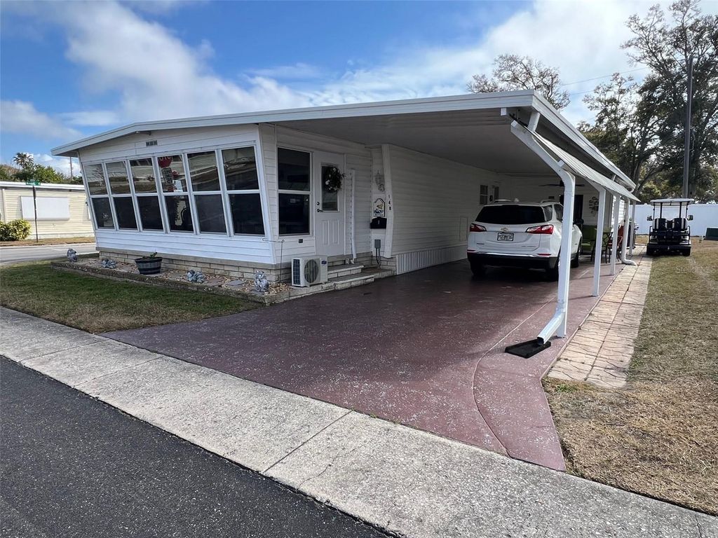 Photo of 148 Pindo Palm Street W, Largo, FL 33770 (MLS # TB8476422)