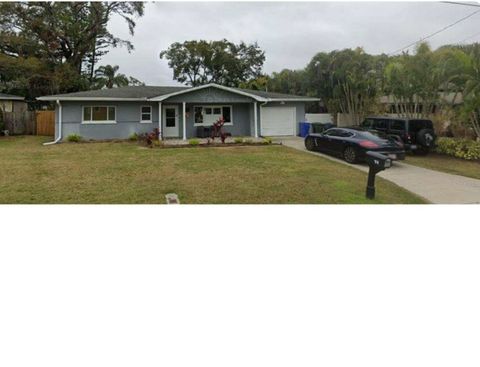 Photo of 1976 Summit Drive, Dunedin, FL 34698 (MLS # TB8491851)