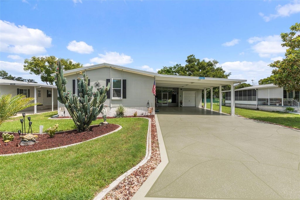 Photo of 8084 Little Tee Lane, Brooksville, FL 34613 (MLS # TB8543165)