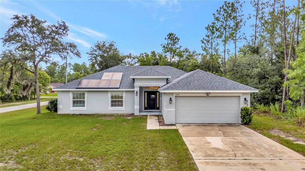 Photo of 8241 SW 132 Loop, Ocala, FL 34473 (MLS # OM729252)