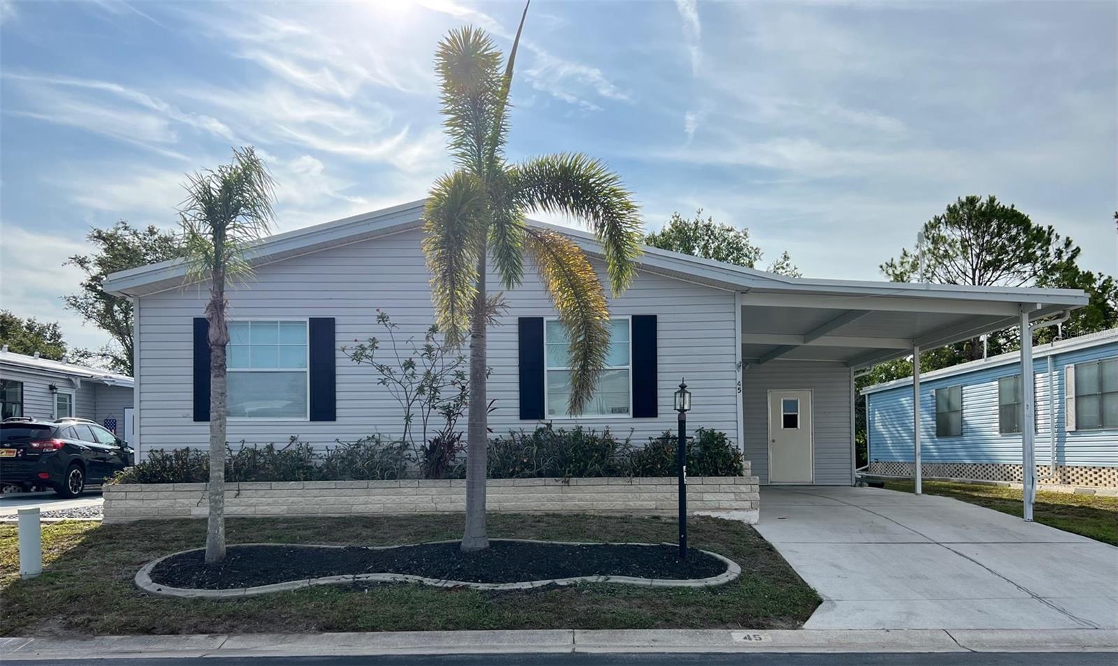 Punta Gorda is a wonderful place to enjoy life and so is living at Burnt Store Colony, a 55+ gated resident owned maintenance free community. This spacious home has three bedrooms, two baths, 1465 sq ft of living space, a shed and includes park land share. As you enter the open living room, it features vaulted ceilings, a separate dining room area with laminate flooring throughout. The master bedroom has a soaker tub, walk in shower and large walk-in closet. The third bedroom is currently used as an office but imagine the possibilities of the additional space in this rare find. The kitchen has plenty of cabinets with an eat in breakfast nook area, and inside laundry. It has a large, enclosed Florida room to enjoy your morning coffee while viewing your private backyard and listening to the serene sounds of nature. This beautiful community has low HOA fees and offers amenities and activities for all from social events, dances, potlucks, bingo, exercise room, horseshoes, pickleball, heated pool and spa, tennis court, bocce, and shuffleboard. It is centrally located to Punta Gorda and Fort Myers airport, beaches, shopping, golf, boating, and/or local restaurants. Burnt Store Colony was selected in 2022, as a top three SW Gulf Coast communities in which to live in. The home comes furnished. Make your appointment to see it today.