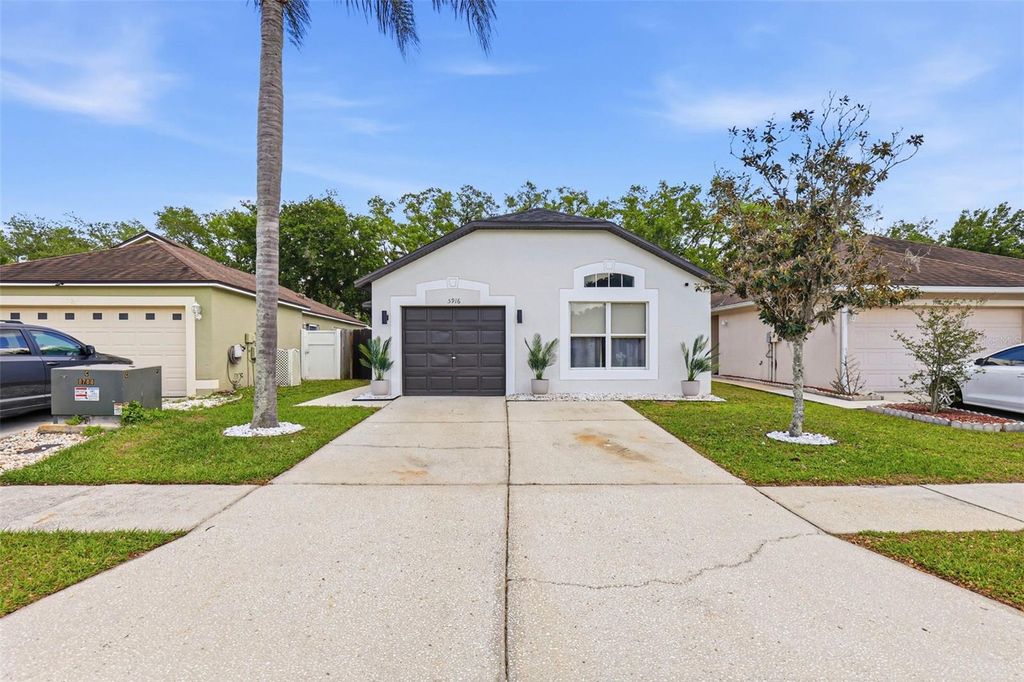 Photo of 5916 Lake Front Drive, Wesley Chapel, FL 33545 (MLS # TB8496651)