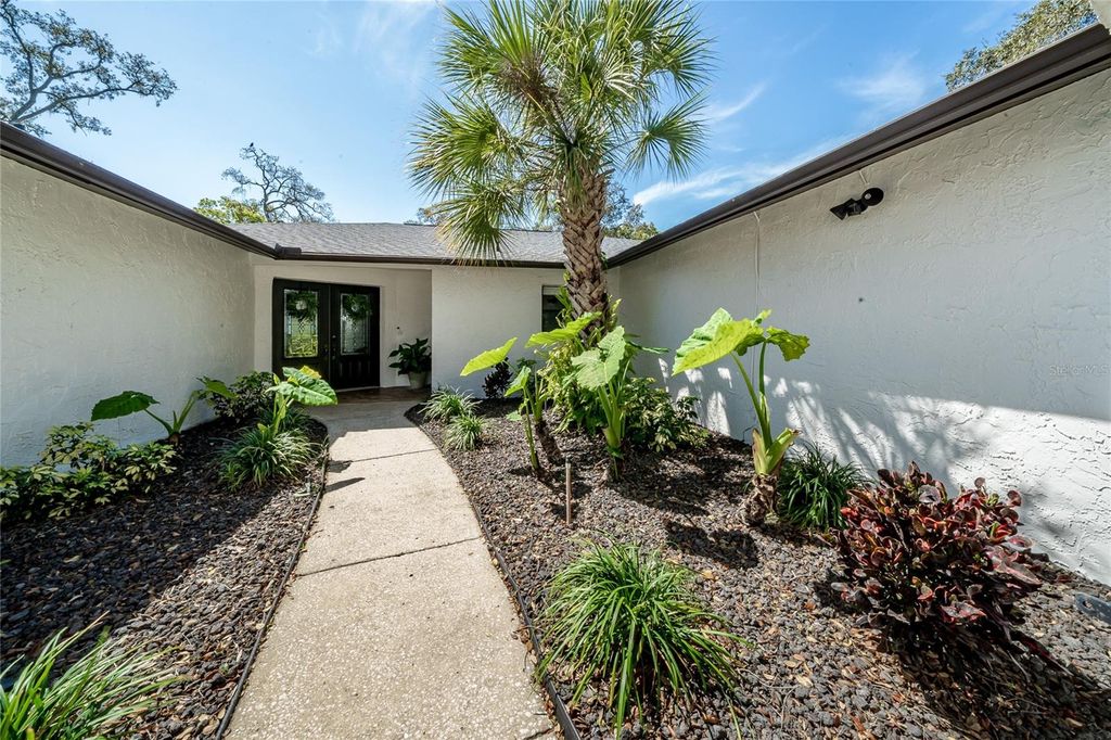Photo of 7608 Laurel Oak Court, Port Richey, FL 34668 (MLS # TB8487930)