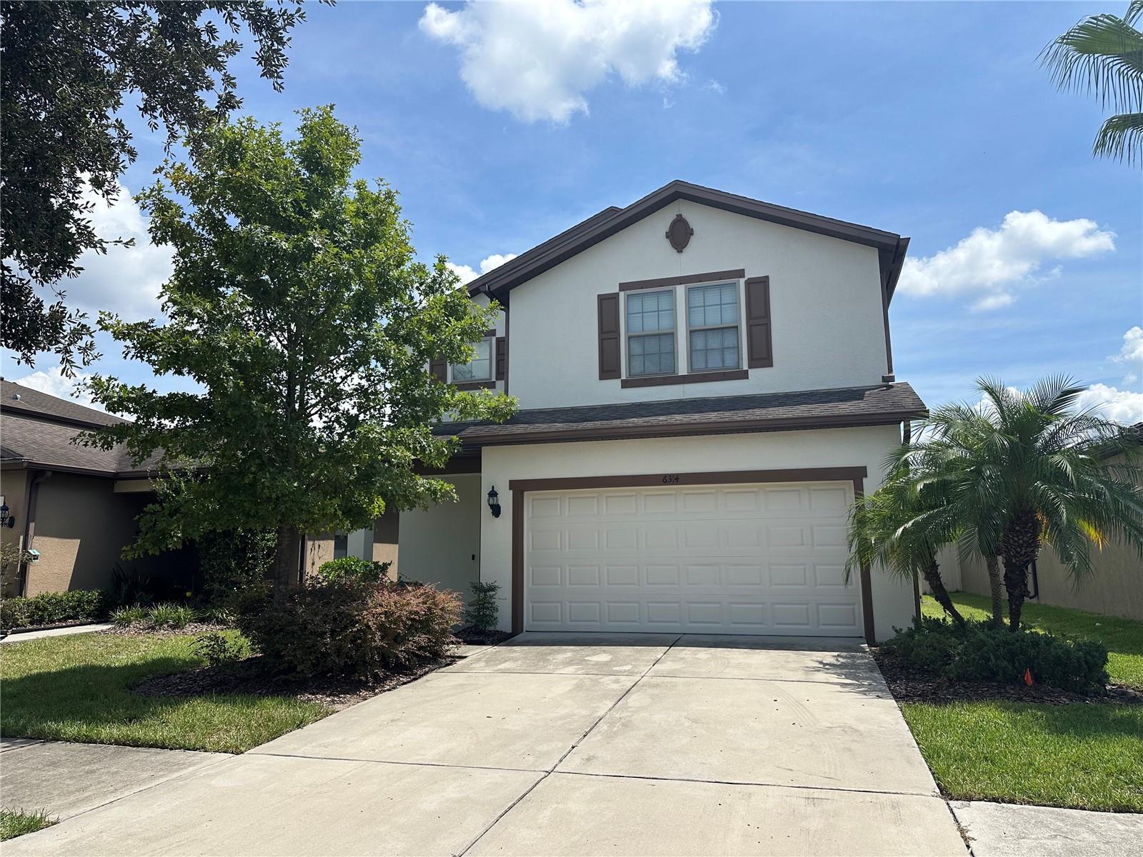 Welcome to this spacious 4-bedroom, 2.5-bathroom home offering over 2,200 sq/ft of comfortable living in a gated Riverview community near Tampa and Brandon. Fresh repainted inside out. Designed with versatility in mind, the floor plan provides room for both everyday living and special gatherings. On the first floor, the kitchen opens to the dining and living areas, creating a natural hub for meals and conversation. A covered lanai extends your options outdoors—ideal for cookouts, morning coffee, or simply relaxing in the shade. The backyard is fully fenced, offering privacy, security, and a perfect space for pets or play. One bedroom on the main level is well-suited for a home office, exercise space, or guest room. Upstairs, a central loft adds another layer of living space, while the primary suite features a generous walk-in closet and bathroom with dual sinks. Each of the secondary bedrooms also includes its own walk-in closet and shares a full bath.Neighborhood amenities include two swimming pools, a basketball court, and a playground. The HOA fee covers lawn care, making it easy to maintain a tidy yard without extra effort. Convenient access to highways, shopping, and dining ensures you’re close to everything you need.This home combines comfort, function, and community—ready for its next chapter with you.