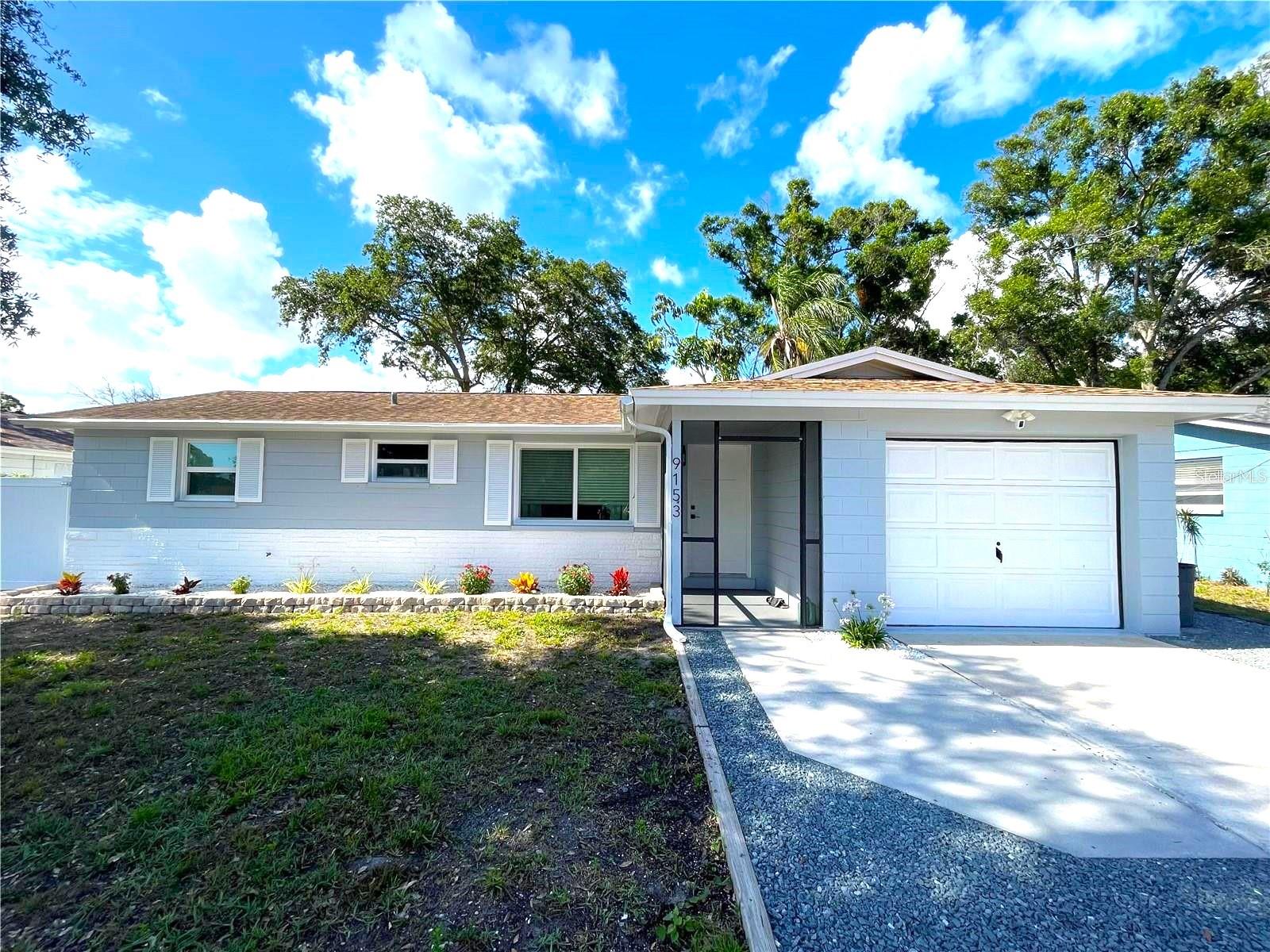 Welcome to this move-in ready, newly renovated 3-bedroom, 1-bath home located in the heart of Seminole!
Step inside to discover an inviting open-concept living area that flows seamlessly into a spacious eat-in kitchen. The kitchen boasts stylish tile flooring, soft-close shaker cabinets, quartz countertops, and a full suite of stainless steel appliances. A built-in coffee bar with a mini fridge adds a touch of convenience and charm, perfect for keeping your favorite beverages chilled.
Just off the kitchen, a generously sized screened lanai offers the perfect setting for year-round entertaining, protected from the elements. The expansive backyard, fully enclosed with a brand-new vinyl privacy fence (2024), features an 18’ x 52” above-ground pool and plenty of outdoor space for gatherings and recreation.
The beautifully remodeled bathroom showcases marble tile throughout, a coastal-inspired vanity, a fog-proof medicine cabinet, and a Bluetooth exhaust fan for modern comfort. A separate indoor laundry room is conveniently connected to the one-car garage, offering enough space to add an additional half or full bath if desired.
All three bedrooms are designed for both style and durability, featuring waterproof LVP flooring, upgraded closets with barn doors, and ample storage.
This home is hurricane-ready with sturdy block construction, new hurricane-impact windows, front door, and sliding glass door (2025). The roof and AC system were both replaced in 2015, and a new irrigation system was installed in 2024 for effortless lawn care.
Located within a highly desirable school district, you’re within walking distance of Starkey Elementary and Osceola Middle and High Schools. Nature enthusiasts will love being just a short stroll from Lake Seminole Park, with its scenic walking paths, lake views, and boat ramps. Plus, the home is just minutes from the area’s beautiful beaches, top-rated restaurants, shopping, and more.
Best of all, no flood insurance is required—this property is outside of any flood zone and has not been impacted by hurricanes. Make your appointment to tour NOW as this home is too immaculately appointed to Last Long !