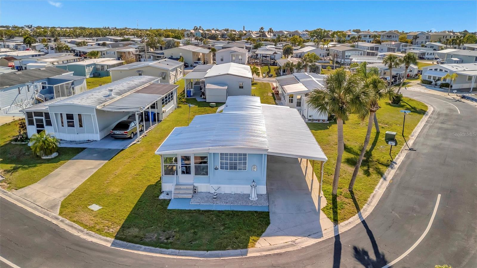 Welcome to Caribbean Isles, a vibrant 55+ gated waterfront community where friendly neighbors and resort-style amenities make every day feel like a vacation!
This charming 2-bedroom, 1-bath home is truly move-in ready and filled with updates that providing peace of mind. Don't let its age fool you, recent upgrades include a new roof, HVAC system with updated ductwork, washer and dryer, and a brand-new carport. Inside, natural light fills the living room and hallway, highlighting the stylish laminate flooring. The spacious primary bedroom easily accommodates a king-sized bed and boasts 10 feet of in-wall closets for all your storage needs.
Love the outdoors? You’ll feel right at home here! Launch your kayak or boat from our private facilities and explore the scenic canal system with direct access to Tampa Bay. Prefer to stay on land? Join a friendly game of bocce ball, shuffleboard, or horseshoes. When it's time to unwind, take a dip in our heated year-round pool or head to the clubhouse, where you’ll find a craft room, game room, pool tables, card tables, bar shuffleboard, and darts—perfect for socializing and having fun.
There’s always something happening in Caribbean Isles! Our community events and activities range from themed dinners and dances to exciting social gatherings that make it easy to connect with neighbors and enjoy an active lifestyle.And let’s not forget the unbeatable location located between Tampa and Sarasota/Bradenton, you're just a short drive from stunning beaches, world-class dining, shopping, and thrilling amusement parks.Come see for yourself why so many call Caribbean Isles home.