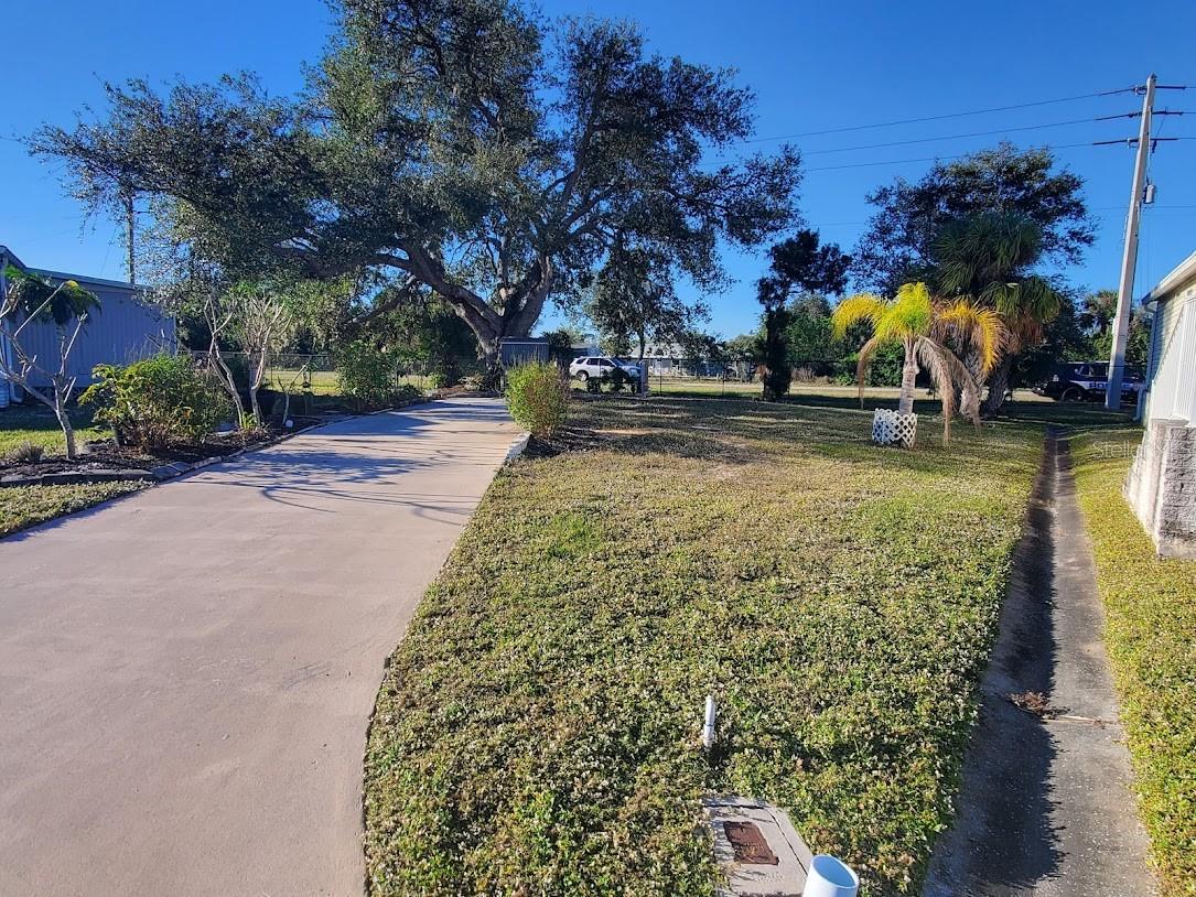 LAND OWNED, DEEDED, 55+ GATED COMMUNITY. Thats right Fee Simple you own the land. ($1556.16 yr
maintenance fee is already included in the property taxes) located in a low traffic cul de sac with a large
Heritage Oak for shade. driveway, FPL meter and Utility meter on site. The park is close proximity to stores, banks, restaurants and the Atlanta Braves
Training Facility, also 2 heated pools, shuffleboard, ping pong, a library, fitness center, pickle ball, bocce ball
and a full calendar of cultural events, plus more!
PER OWNER THE DRIVEWAY DOES NOT NEED TO BE REMOVED, NPUTILITIES ARE ON YOU WILL HAVE TO PAY $57. MONTH TO KEEP THE WATER/SEWER FROM BEING DISCONNECTED AND PAYING RE-CONNECTION FEE'S